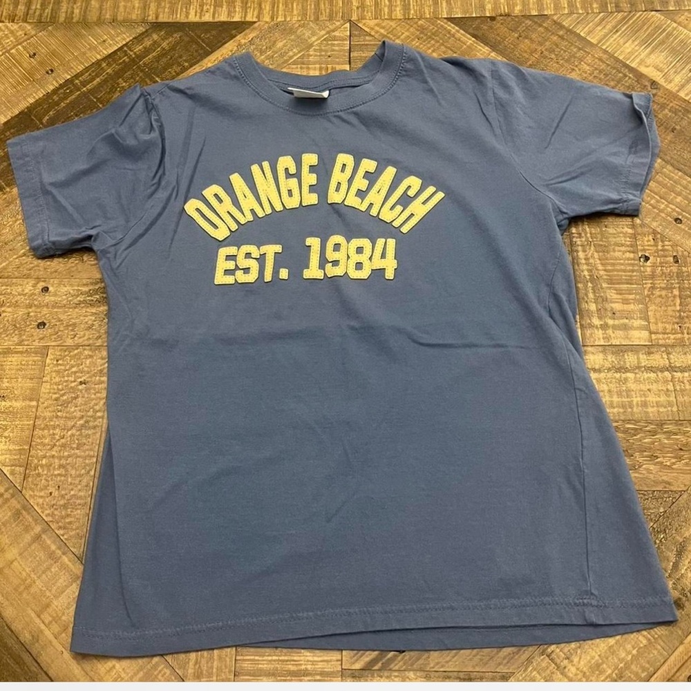 short-sleeve t-shirt featuring the Orange Beach Est. 1984 design